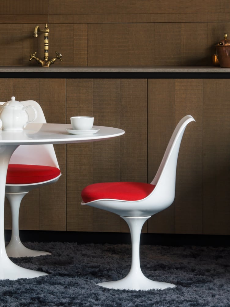 Mid Century Modern White Egg Chairs with Red Cushions and Matching White Table.