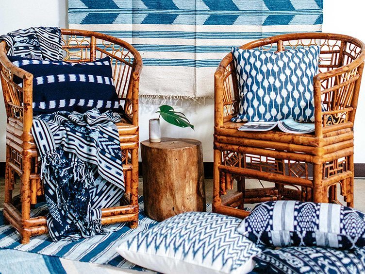 Boho Modern Style Set of Rattan Chairs With Blue and White Blankets and Pillows