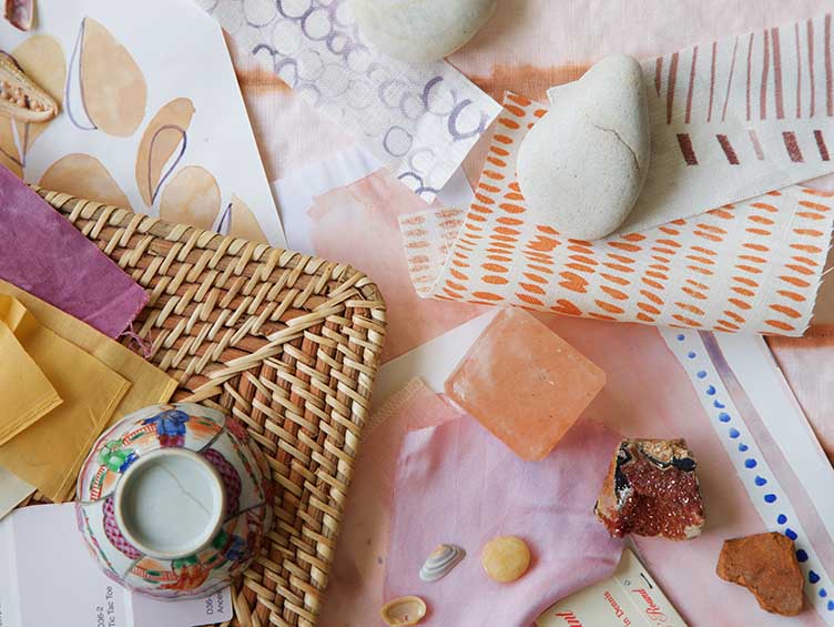 Miscellaneous materials and minerals on wicker tray on work table