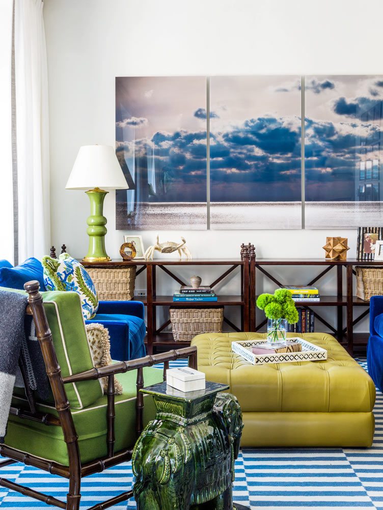 3 Panel Photo, short wooden bookshelf, aqua blue chair set, and deep yellow ottoman