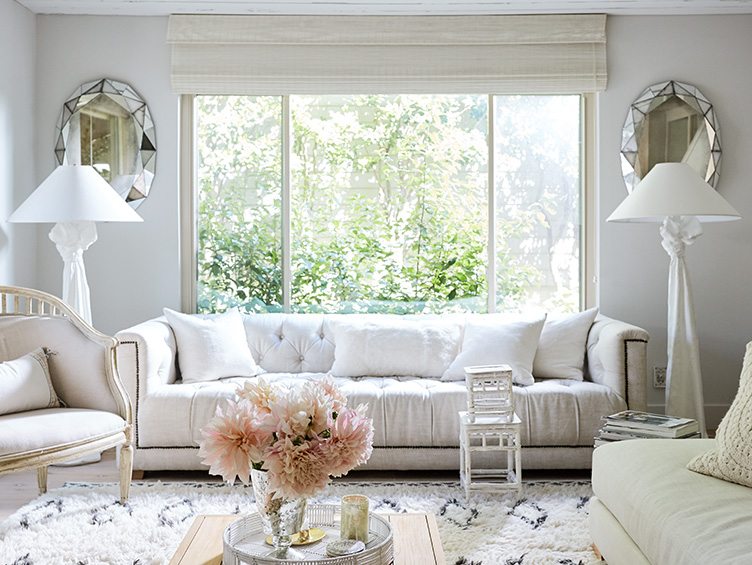 Traditional Living Room with White Couch paired with Trompe l’Oeil Draped Standing Lamps