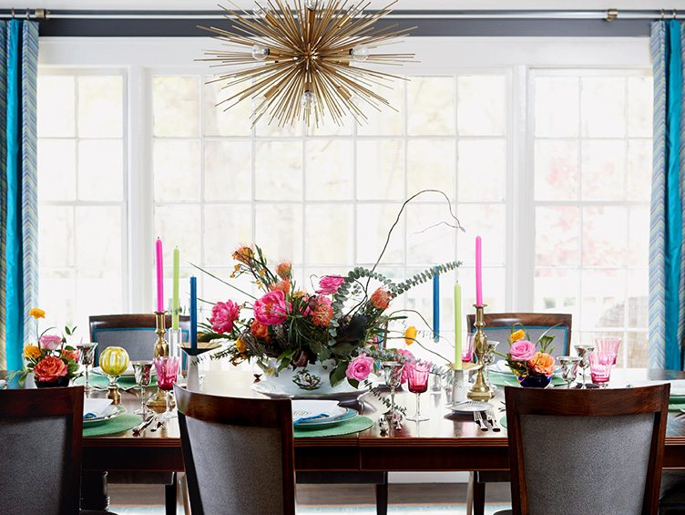 Dining Room Table Set with Vintage Tableware and Colorful Candlesticks. 