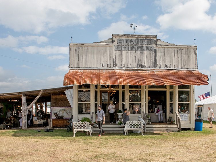 Exterior of antique shop at Round Top in Texas with benches