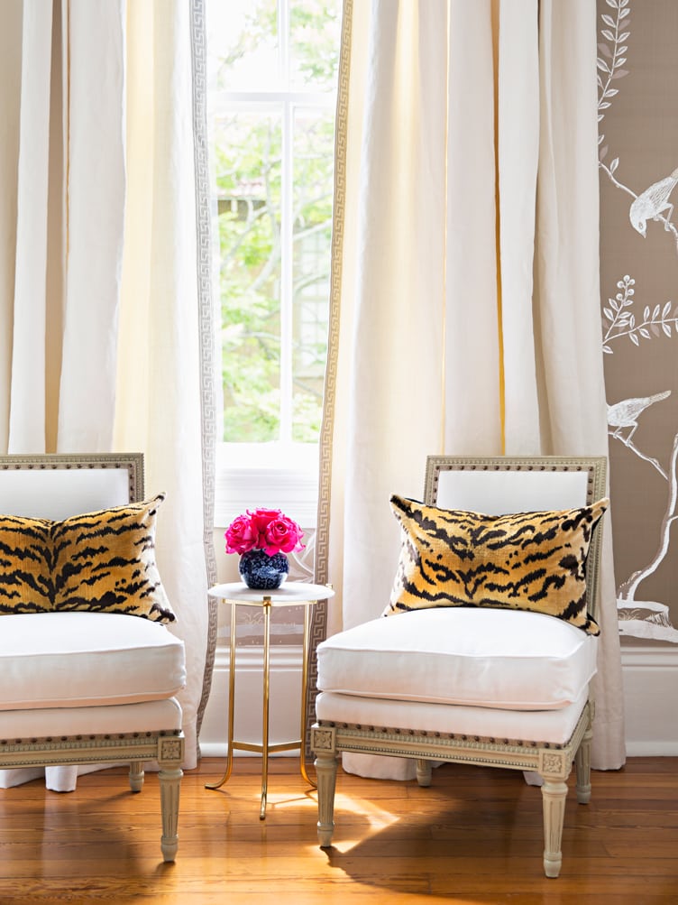 Classic Living Room With Matching Armchairs and Animal Print Decorative Pillows