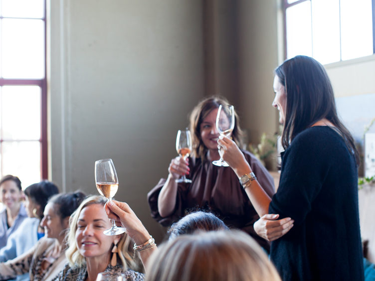 Anna Brockway Toasting Caitlin Flemming at Caitlin Flemming Travel Home Chairish Party