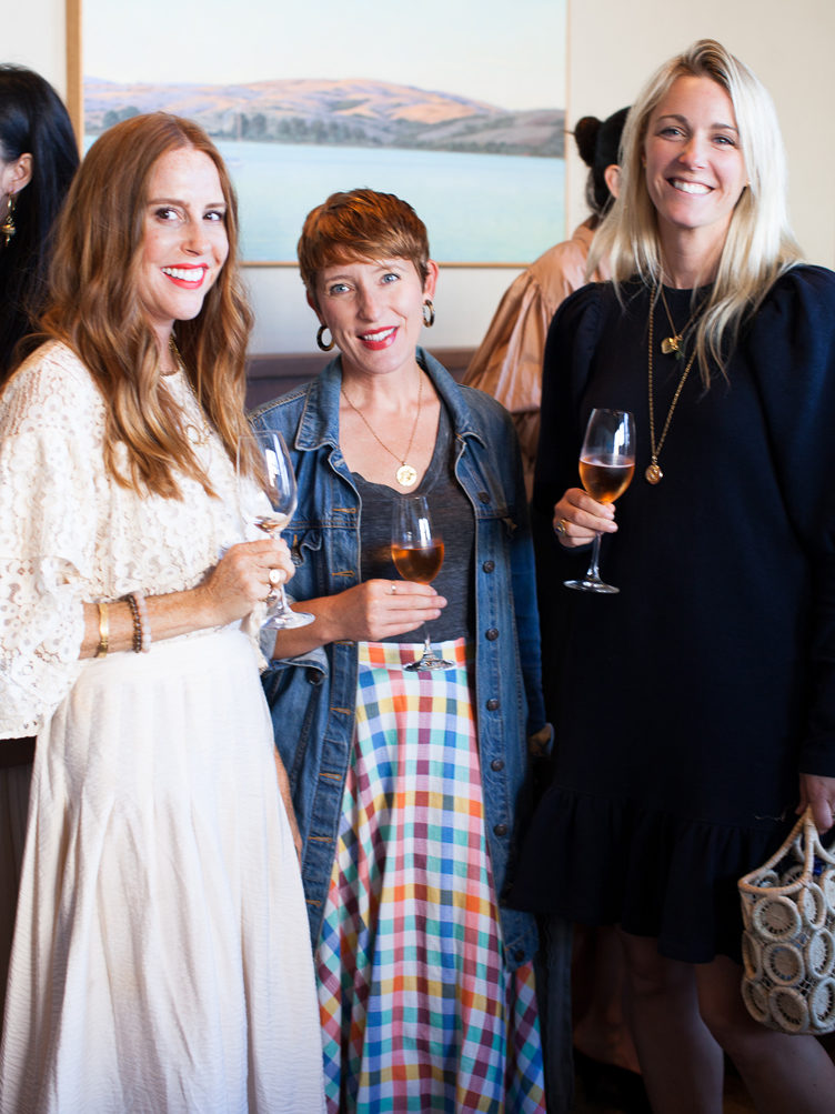 Guests at Caitlin Flemming Travel Home Chairish Party