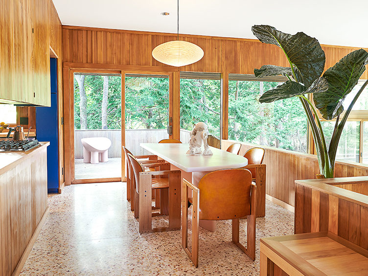 modern dining room, wood paneling, wood kitchen cabinets