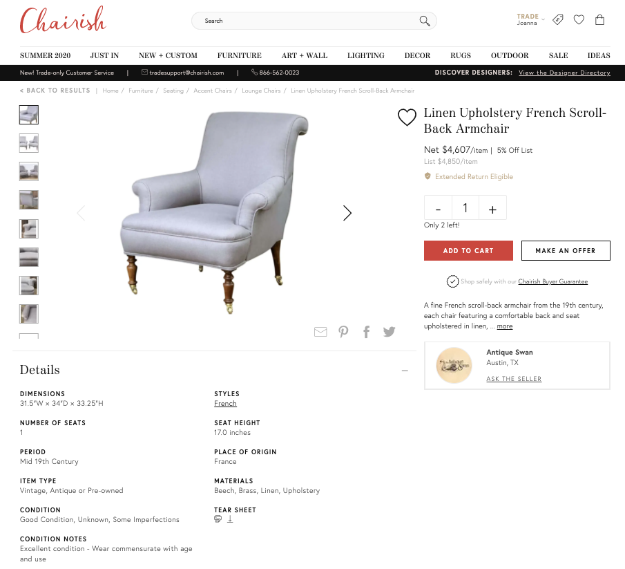 Screenshot of chairish website with upholstered linen French scroll-back armchair