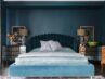 Art Deco Bedroom with teal walls, velvet bed, and mirrored nightstands